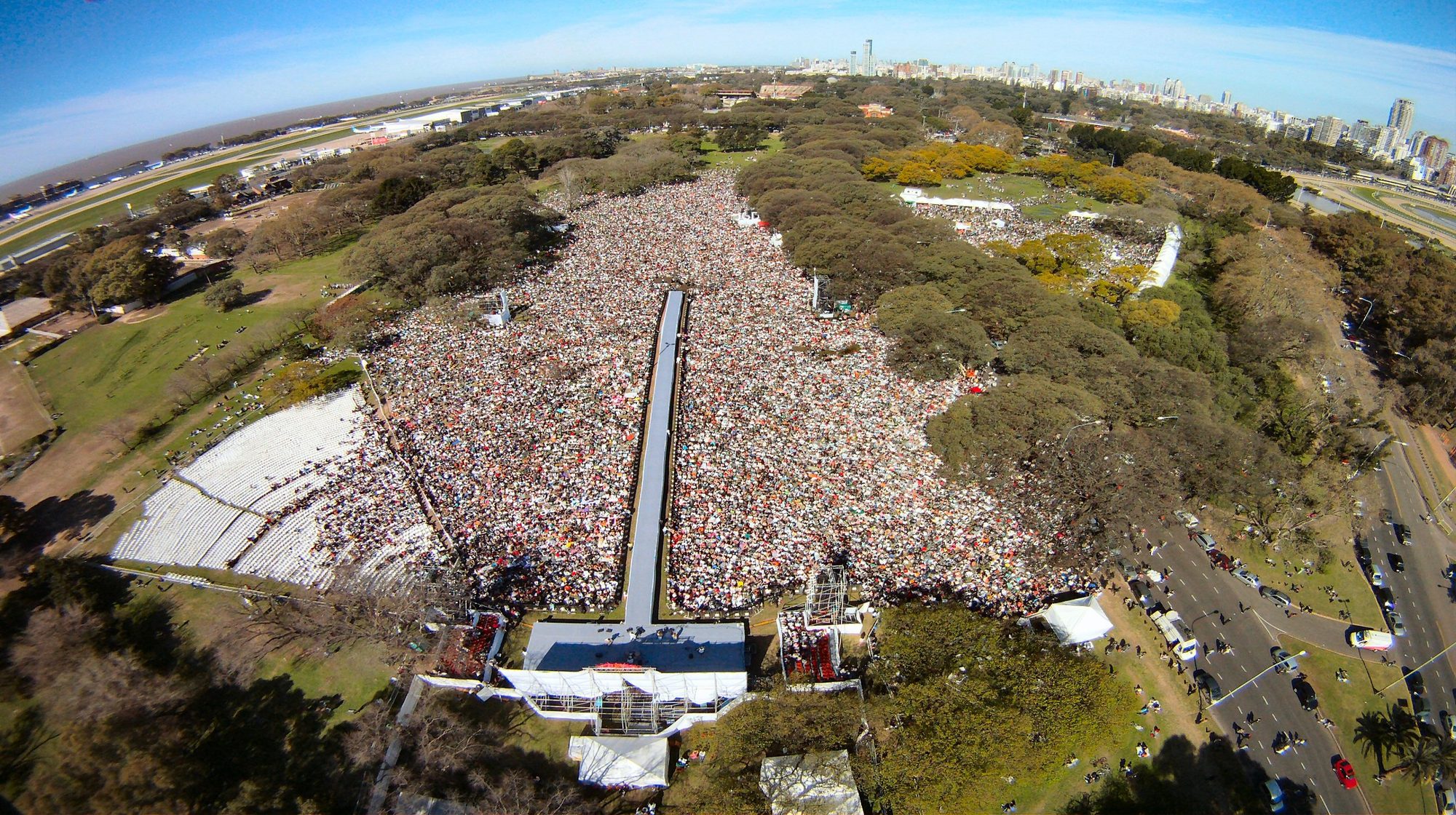 Aerial view of 150,000 people at The Planet Meditates